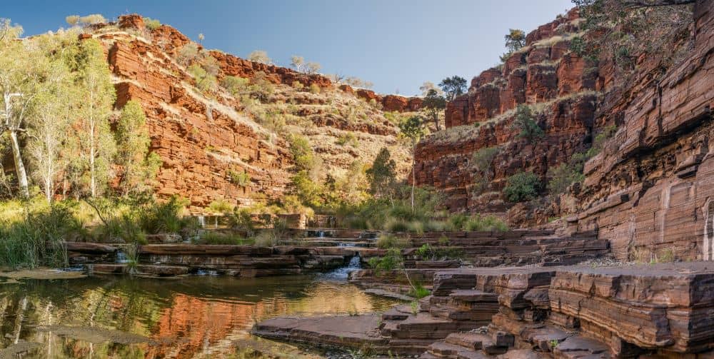 Explore rock tunnels and gorges at Karijini National Park.