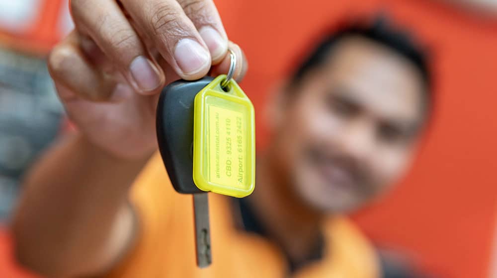 Handing customer car keys